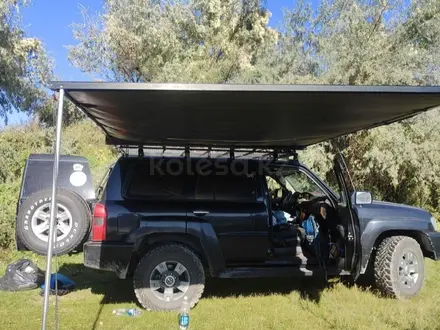 Nissan Patrol 2009 года за 14 800 000 тг. в Алматы – фото 64
