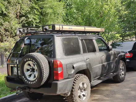 Nissan Patrol 2009 года за 14 800 000 тг. в Алматы – фото 68