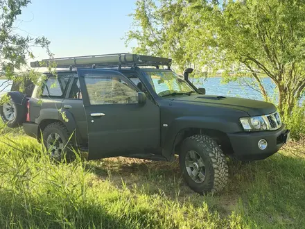 Nissan Patrol 2009 года за 14 800 000 тг. в Алматы – фото 69