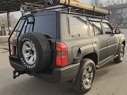 Nissan Patrol 2009 года за 14 800 000 тг. в Алматы – фото 9