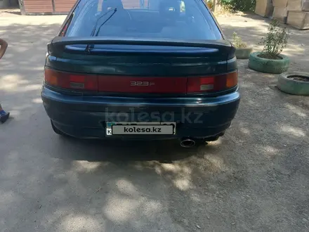 Mazda 323 1993 года за 670 000 тг. в Алматы – фото 4