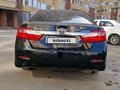 Toyota Camry 2014 года за 8 200 000 тг. в Караганда – фото 2