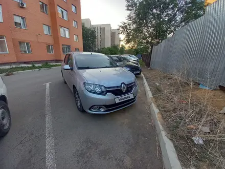 Renault Logan 2015 года за 3 500 000 тг. в Караганда – фото 6