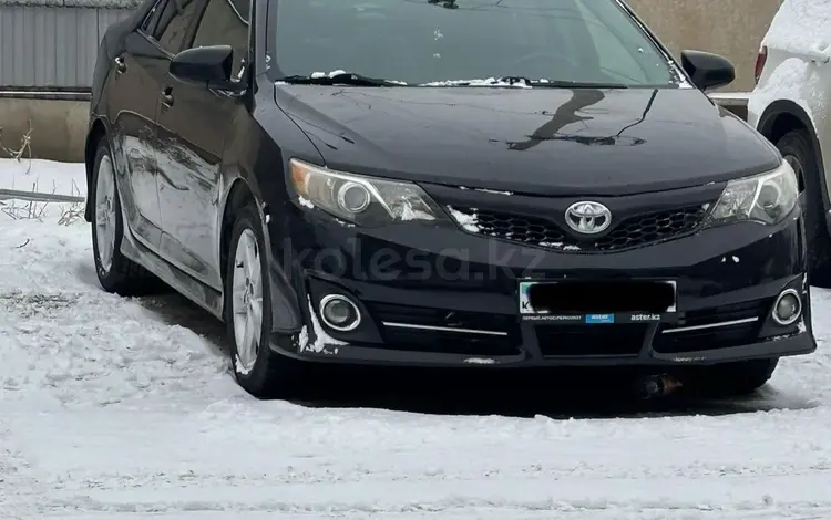 Toyota Camry 2014 годаfor8 200 000 тг. в Алматы