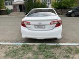 Toyota Camry 2014 года за 5 500 000 тг. в Атырау