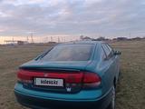 Mazda 626 1995 года за 1 700 000 тг. в Тайынша – фото 4