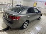 Kia Cerato 2012 года за 5 300 000 тг. в Жанаозен – фото 4