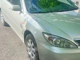 Toyota Camry 2004 годаүшін3 800 000 тг. в Караганда
