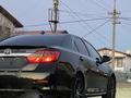 Toyota Camry 2013 года за 7 700 000 тг. в Атырау – фото 33