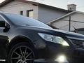 Toyota Camry 2013 года за 7 700 000 тг. в Атырау – фото 37