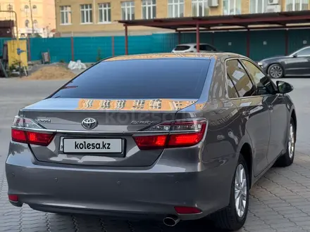 Toyota Camry 2015 года за 10 700 000 тг. в Актобе – фото 2