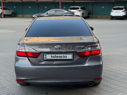 Toyota Camry 2015 года за 10 700 000 тг. в Актобе – фото 6