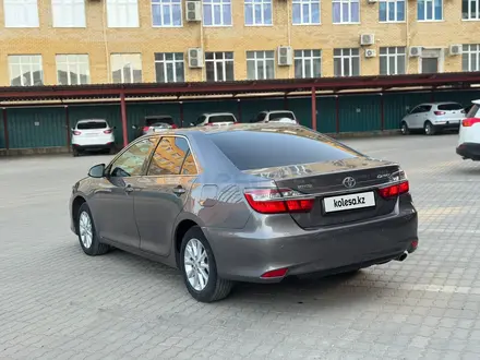 Toyota Camry 2015 года за 10 700 000 тг. в Актобе – фото 7