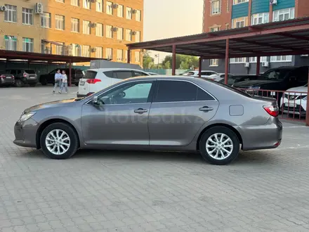 Toyota Camry 2015 года за 10 700 000 тг. в Актобе – фото 8
