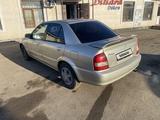 Mazda Protege 2002 года за 2 500 000 тг. в Астана – фото 3