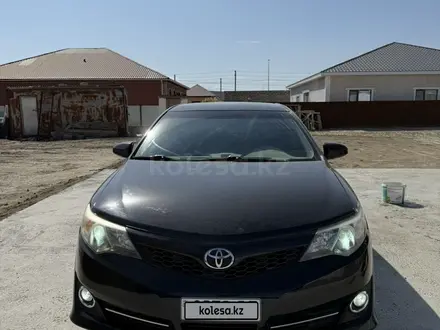 Toyota Camry 2013 года за 5 500 000 тг. в Атырау
