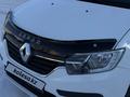 Renault Logan 2018 года за 3 450 000 тг. в Петропавловск – фото 36