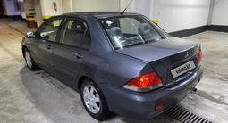 Mitsubishi Lancer 2004 годаfor2 950 000 тг. в Алматы – фото 2