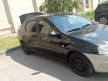 Renault Logan 2012 года за 1 700 000 тг. в Астана – фото 4