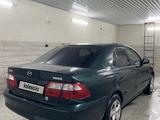 Mazda 626 1999 года за 4 600 000 тг. в Актобе – фото 4