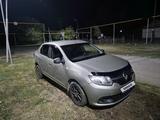 Renault Logan 2014 года за 2 500 000 тг. в Талдыкорган – фото 2