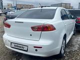 Mitsubishi Lancer 2007 года за 2 581 750 тг. в Астана – фото 2