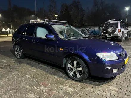 Mazda 323 2002 года за 2 600 000 тг. в Алматы – фото 7