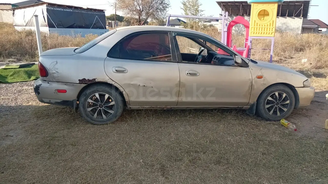 Mazda 323, 1998