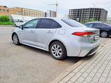 Toyota Corolla 2021 года за 8 400 000 тг. в Астана – фото 4