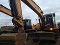 Caterpillar  318 2015 года за 47 000 000 тг. в Астана