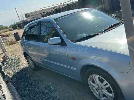 Mazda 323 2002 года за 1 300 000 тг. в Алматы – фото 5