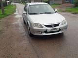 Mazda 323 2002 года за 2 200 000 тг. в Алматы – фото 5