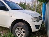 Mitsubishi L200 2011 годаүшін4 800 000 тг. в Уральск