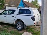 Mitsubishi L200 2011 годаүшін4 800 000 тг. в Уральск – фото 2