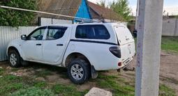 Mitsubishi L200 2011 года за 4 800 000 тг. в Уральск – фото 2