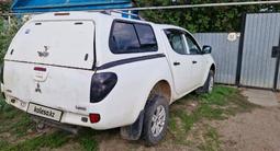 Mitsubishi L200 2011 года за 4 800 000 тг. в Уральск – фото 4