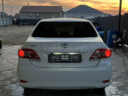 Toyota Corolla 2013 года за 6 700 000 тг. в Атырау – фото 6