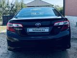 Toyota Camry 2013 года за 6 600 000 тг. в Актобе – фото 5