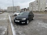 Skoda Rapid 2014 года за 5 900 000 тг. в Астана