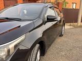 Toyota Corolla 2013 года за 6 550 000 тг. в Актобе – фото 4