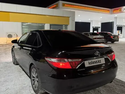 Toyota Camry 2015 года за 8 200 000 тг. в Актобе – фото 4