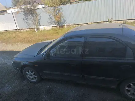 Kia Shuma 2002 года за 1 100 000 тг. в Актобе – фото 4