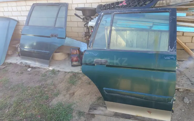 Дверь задняя Mitsubishi Montero sport за 4 020 тг. в Актобе