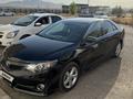 Toyota Camry 2013 года за 7 600 000 тг. в Шымкент