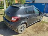 Renault Sandero 2015 годаүшін3 300 000 тг. в Актобе – фото 3