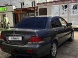 Mitsubishi Lancer 2005 года за 3 100 000 тг. в Астана – фото 2