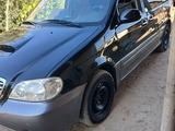 Kia Carnival 2001 годаүшін1 500 000 тг. в Казыгурт