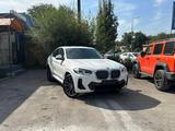 BMW X4 2023 года за 28 500 000 тг. в Алматы