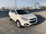 Hyundai Tucson 2012 годаүшін8 900 000 тг. в Караганда – фото 2