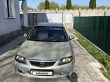 Mazda 323 2002 года за 1 400 000 тг. в Алматы – фото 2
